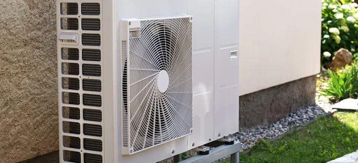 Greers Ferry Heat & Air technician installing and testing a new heat pump system