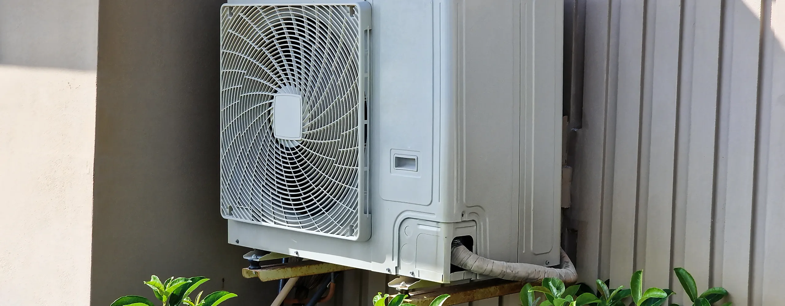 Greers Ferry Heat & Air technician installing a ductless mini-split system in Greers Ferry, AR