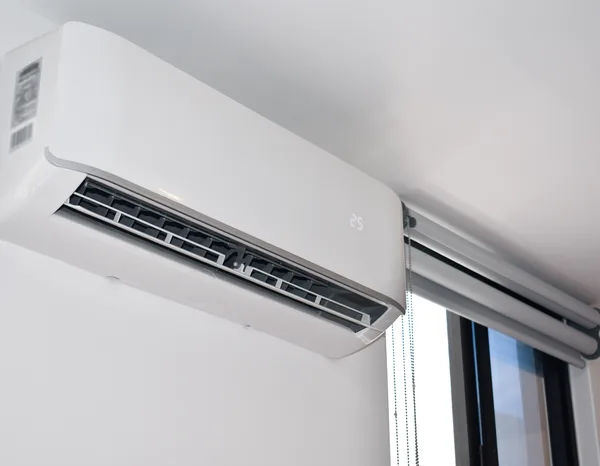 Greers Ferry Heat & Air technician installing a ductless mini-split indoor unit