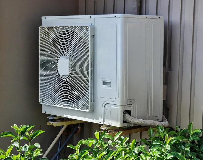 Ductless mini-split head mounted on an interior wall in a central Arkansas home