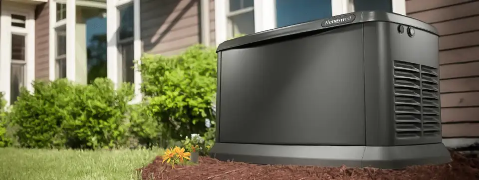 Honeywell Home Backup Generator in front of a home